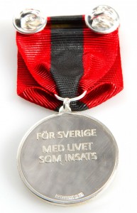 Försvarsmaktens medalj för sårade i strid (baksidan)