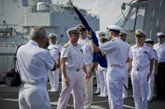 Rear Admiral Guido Rando surrender flag as a symbol of leadership shift.  Photo: Magnus Lindstedt / Armed Forces