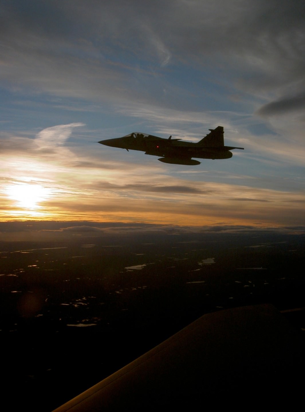 Saab JAS 39 Gripen at sunset over Sweden [1704x2304] [OS] : r/MilitaryPorn